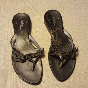 Black leather flip flops